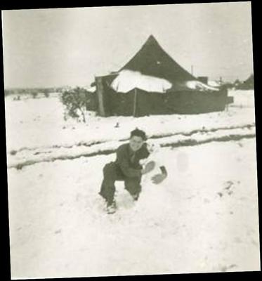 Flight Engineer Lee Wright from the Pelzman crew making a San Pan snowman.