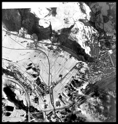 February 27, 1945 - Target:  Salzburg, Austria Marshalling Yards.  The yards are located in the bottom right hand corner  of the photo.  Spot the hits?
