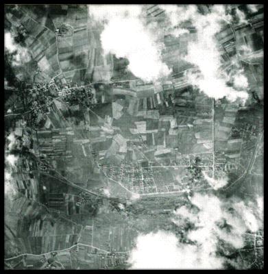 March 19, 1945 - Target:  Landshut, Germany Marshalling Yards.  Note bombs hitting in a string in lower right, through a residential area down to the yards.